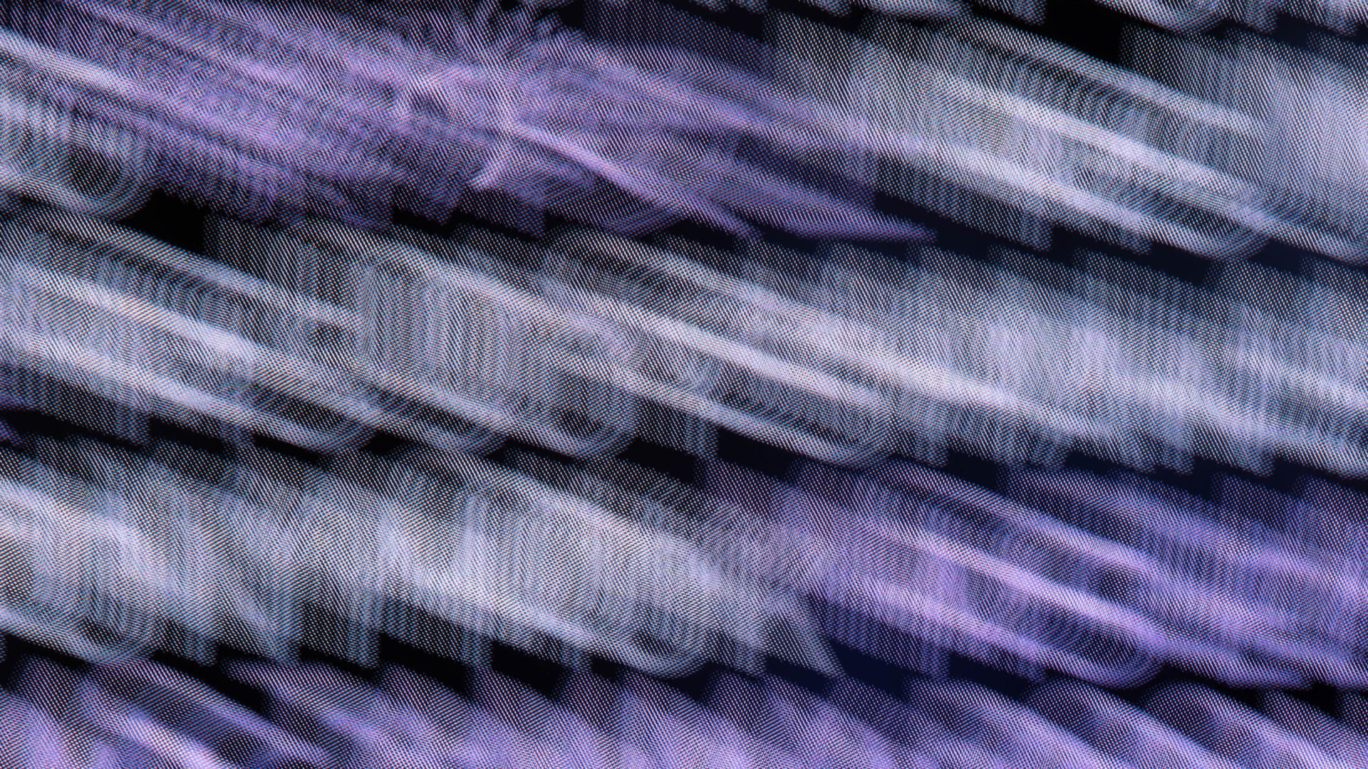 Blurry text from an exhibition at the M+ museum in Kowloon, Hong Kong